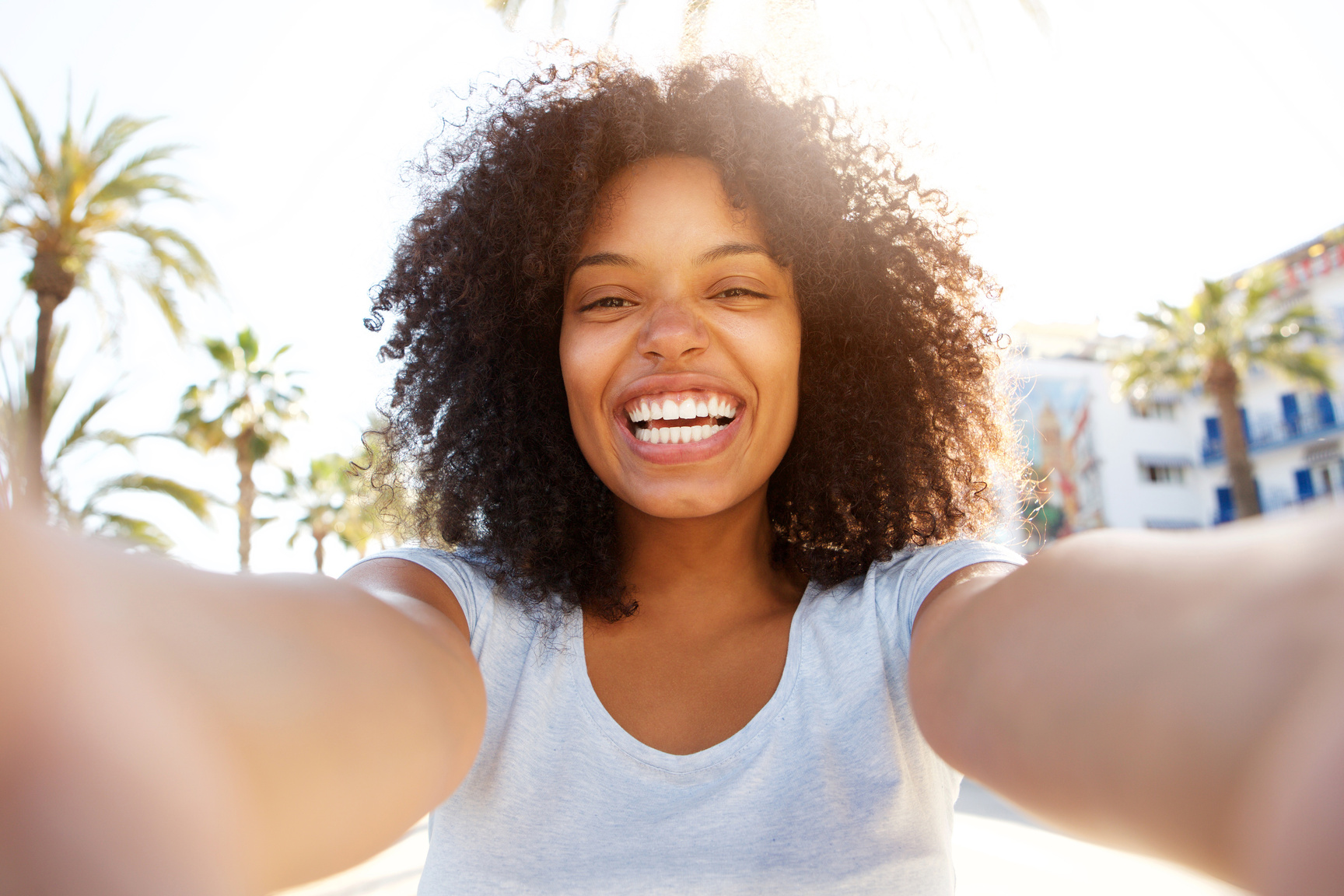 Happy Woman Taking Selfie Outdoors